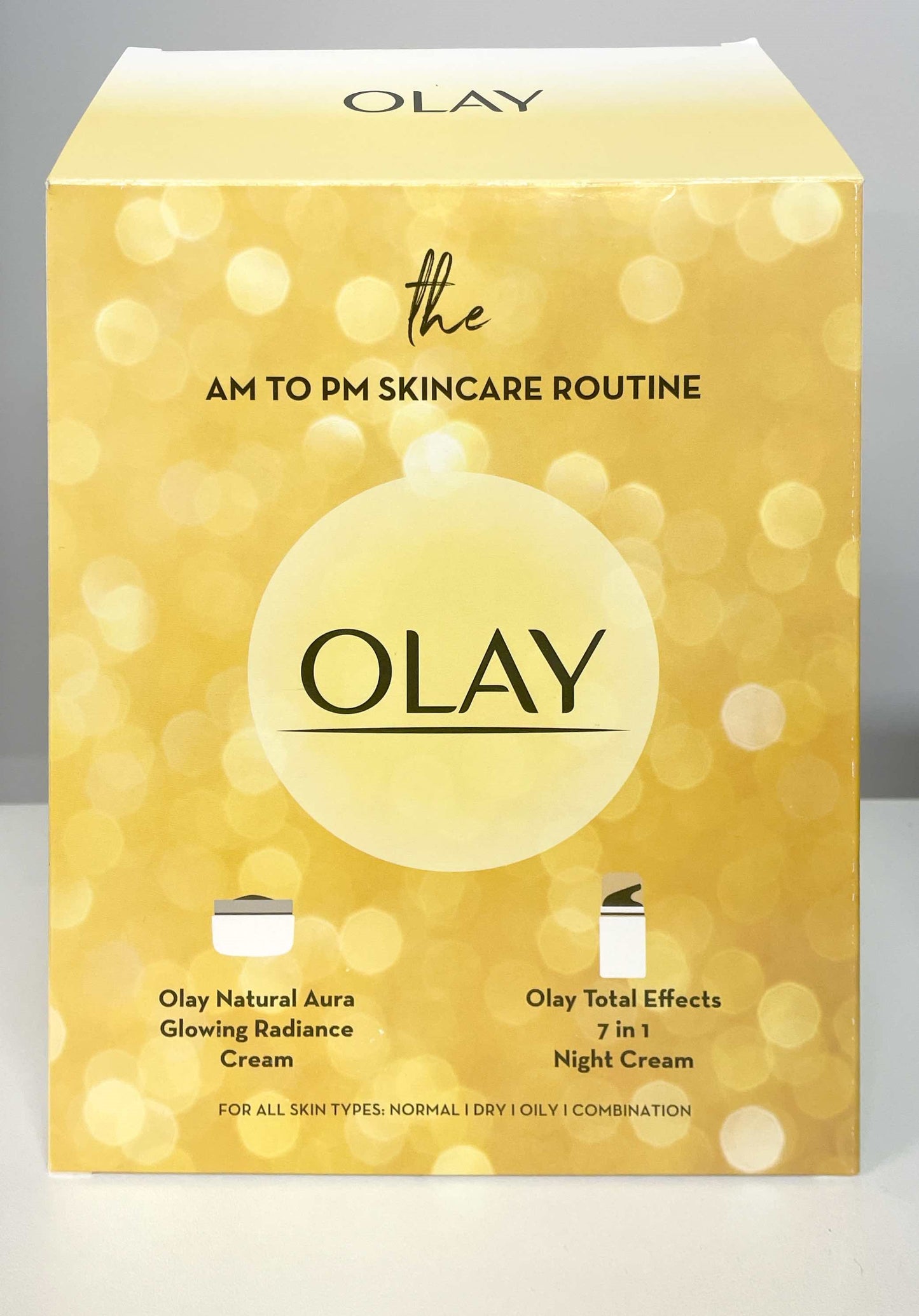 Olay The AM To PM Skincare Routine 2 Piece Gift Set…Set Contains: Olay Natural Aura 1.7 oz Glowing Radiance Cream (Day SPF 15) & Olay Total Effects 1.7 oz 7 in 1 Night Cream